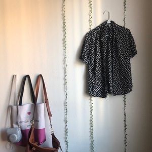 abstract white and white button down shirt.